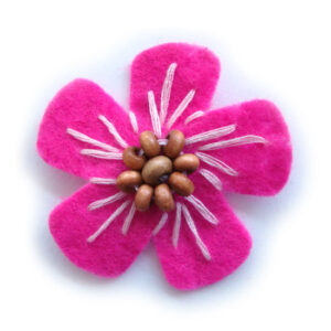 fiorellino lenci con perle legno e ricamo - col. Fucsia